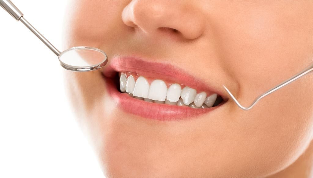 Bright healthy smile after cosmetic dental treatment